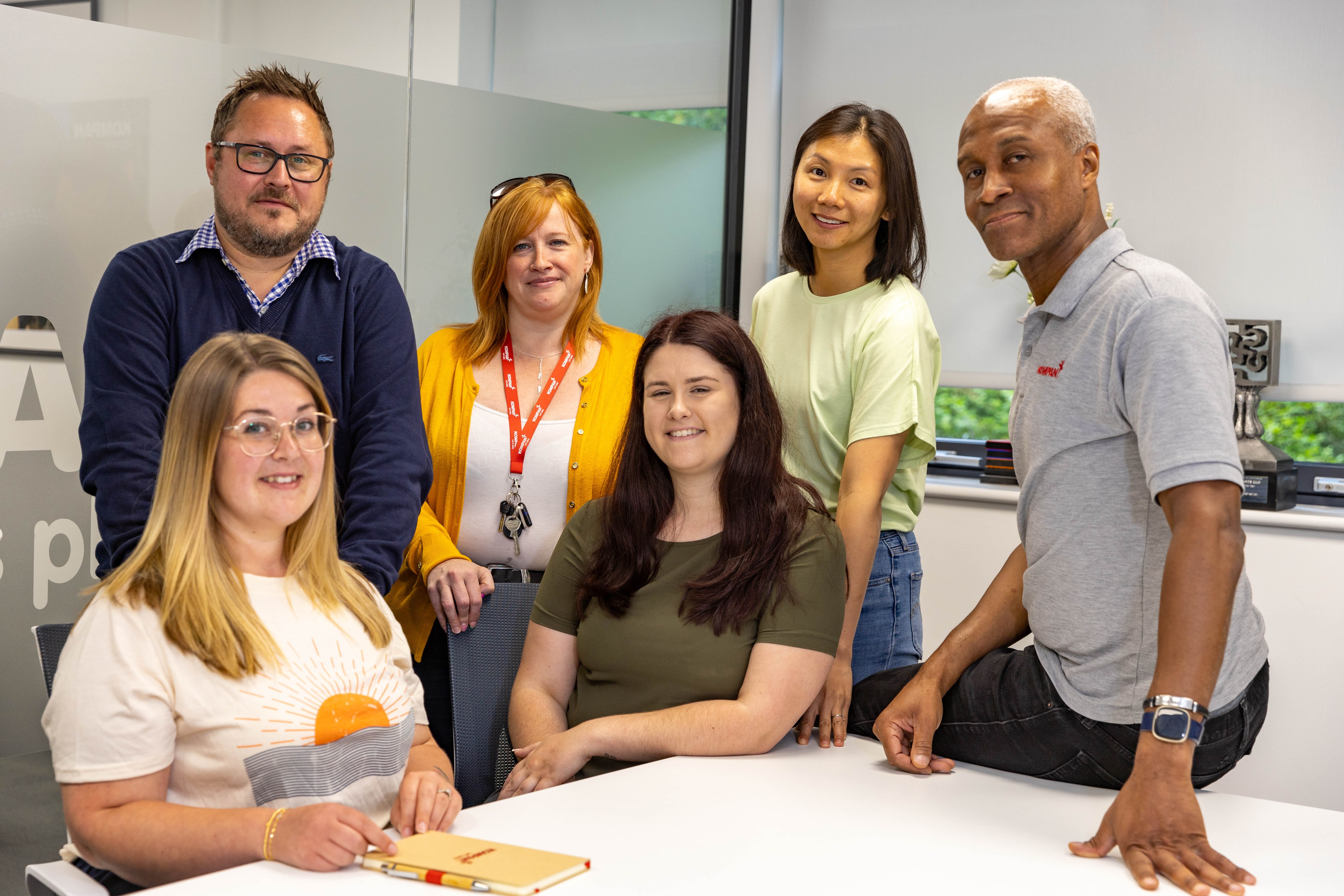 Eliza Thomas, left, with Kompan’s mental health first-aiders Keiren Browne, Sarah Biddle, Chloe Moutrie, Helen Lam and Graham Clarke