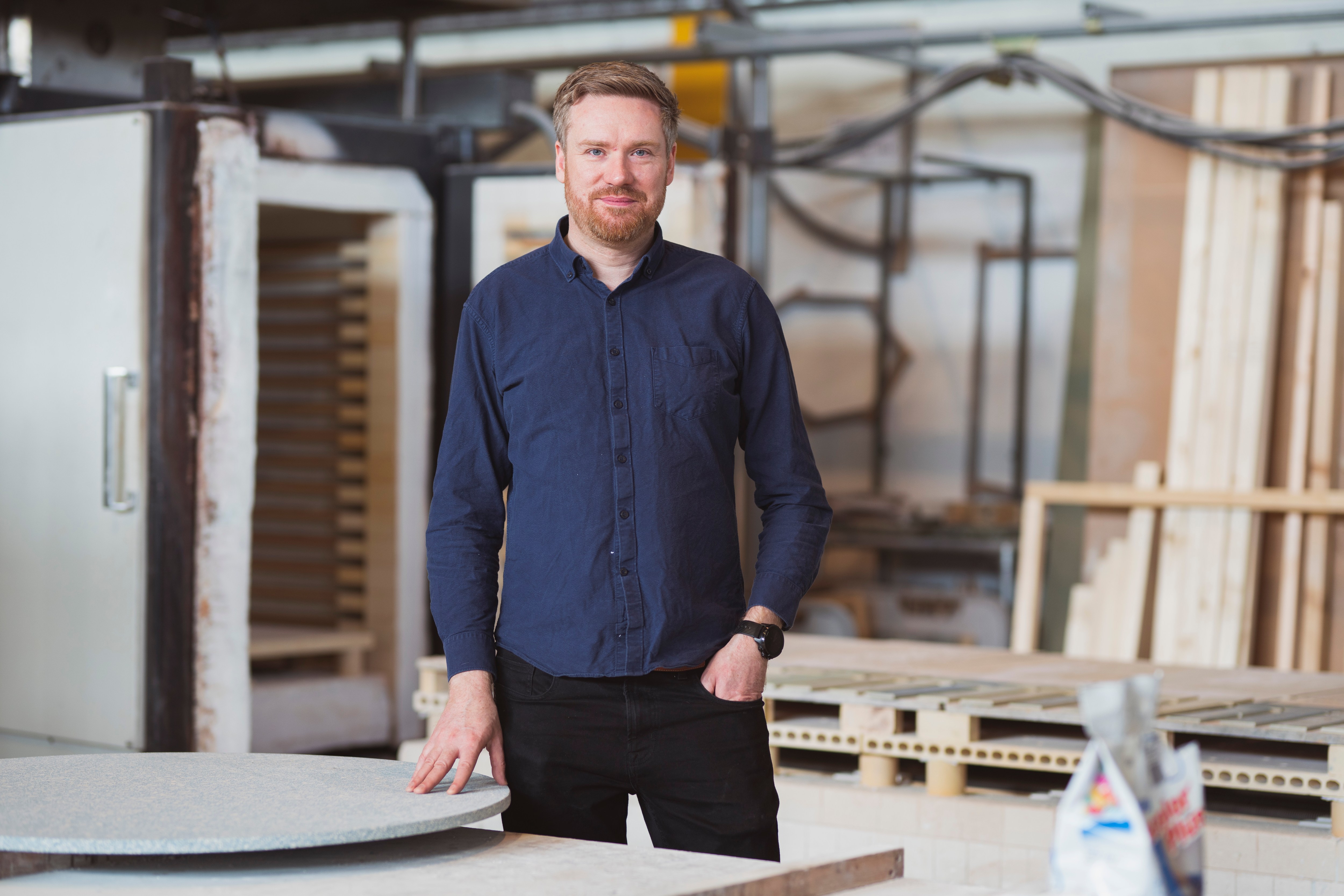 Alasdair Bremner, CEO of Alusid, in a factory.