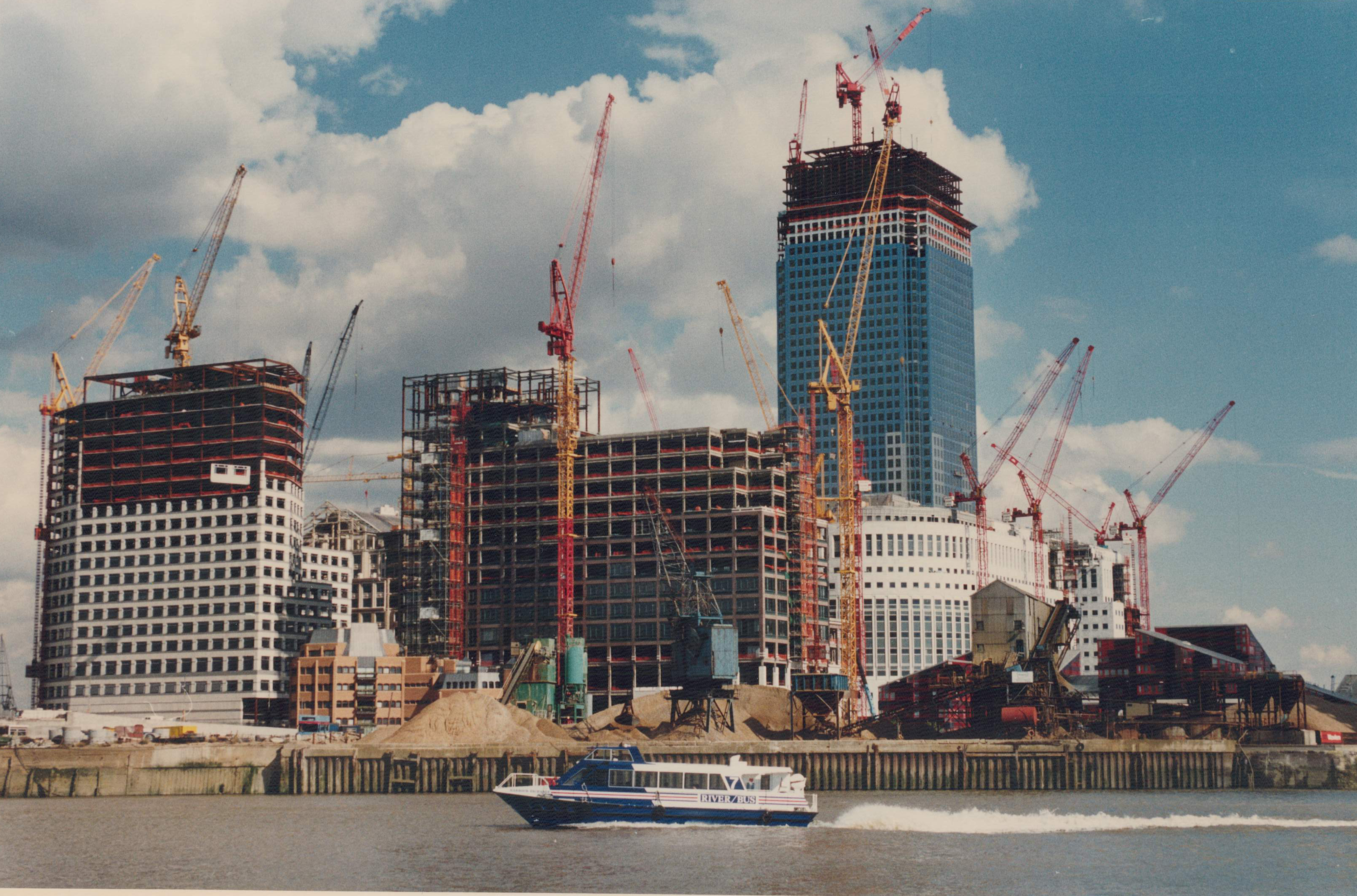 Early construction of Canary Wharf promised a bright new future for the area but it became dominated by office buildings with inadequate transport links