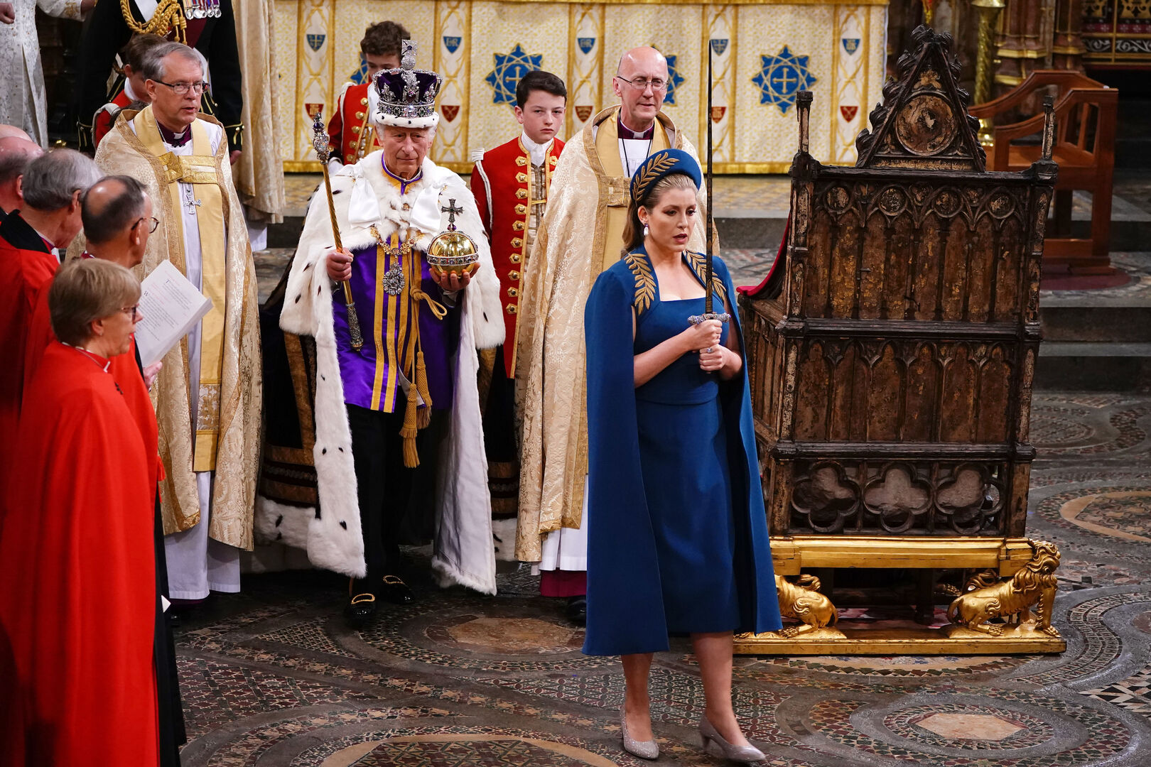 Penny Mordaunt carrying the Sword of State during King Charles III's coronation.