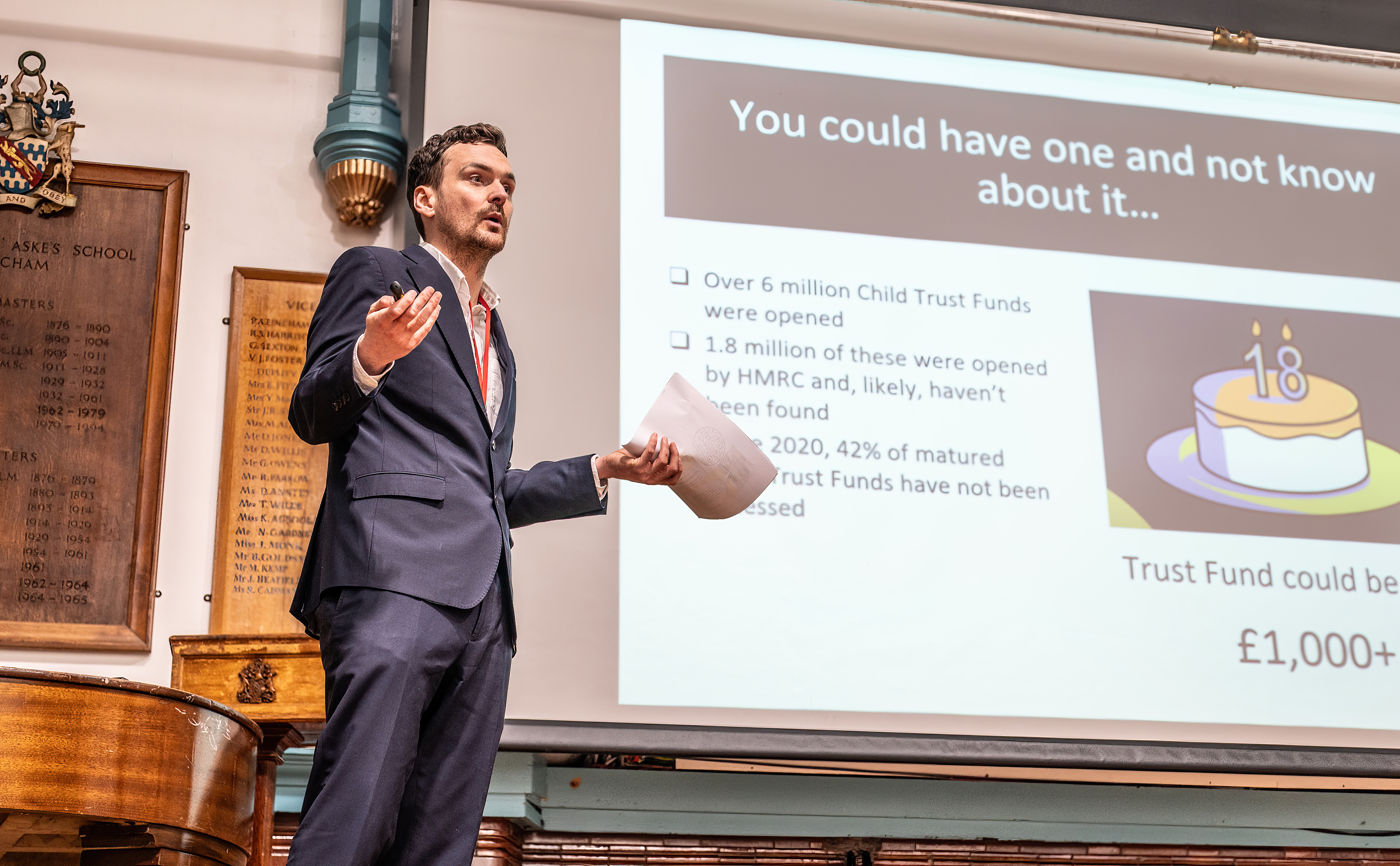 A man giving a presentation about unclaimed Child Trust Funds.