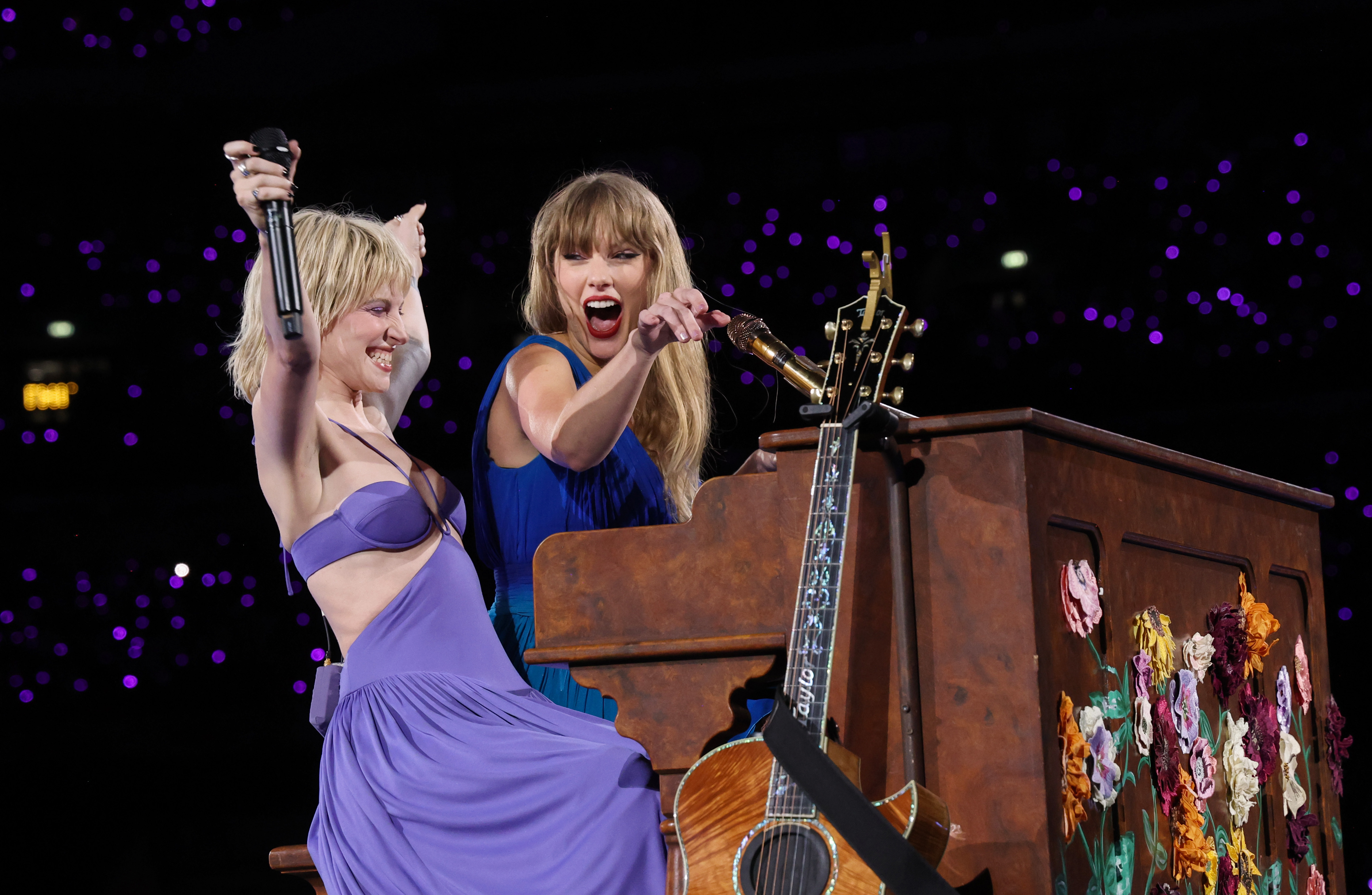 Hayley Williams of Paramore performs a duet with Taylor Swift during her Eras Tour at Wembley Stadium