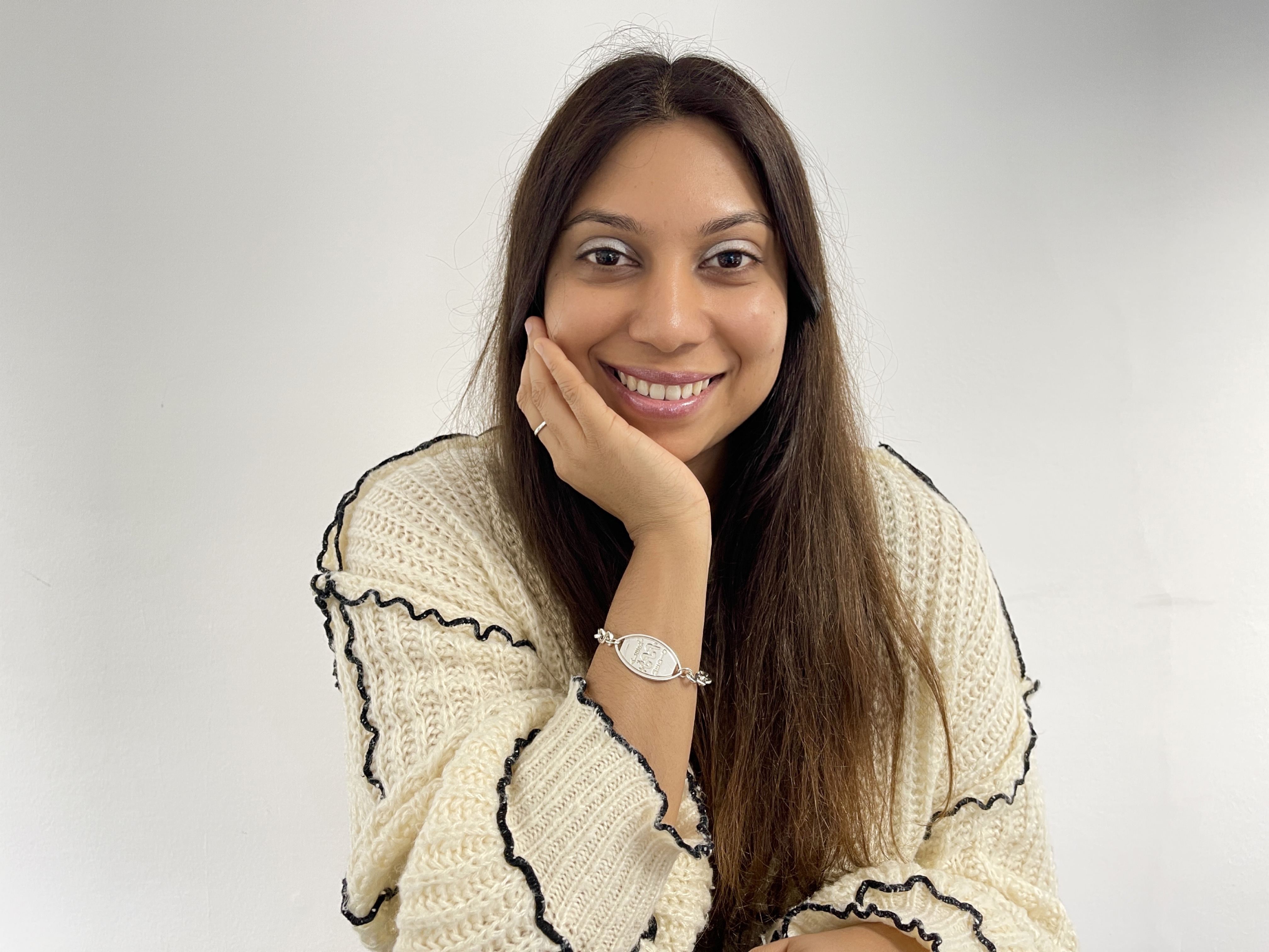Portrait of a woman smiling.