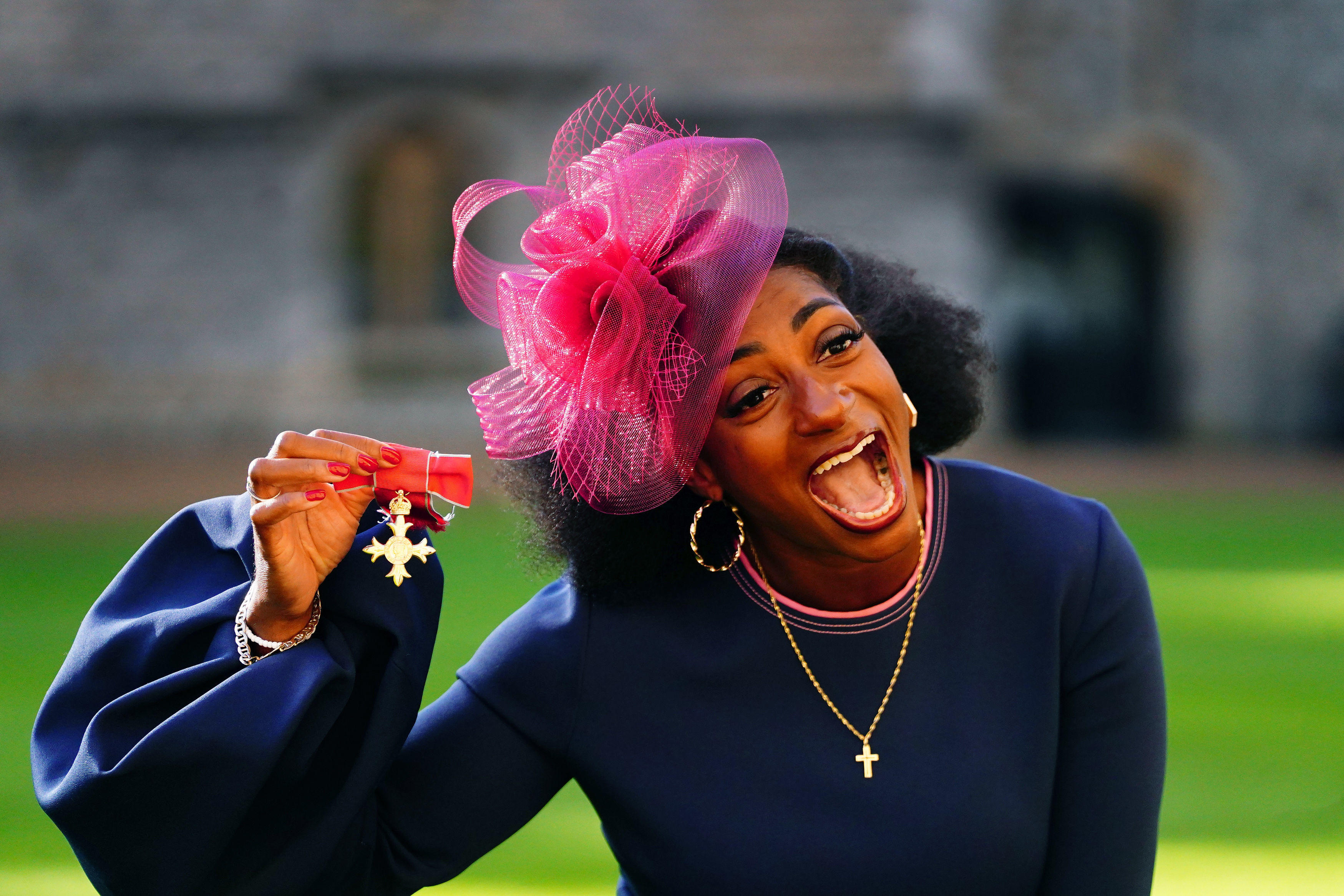 Cox with her OBE in 2022