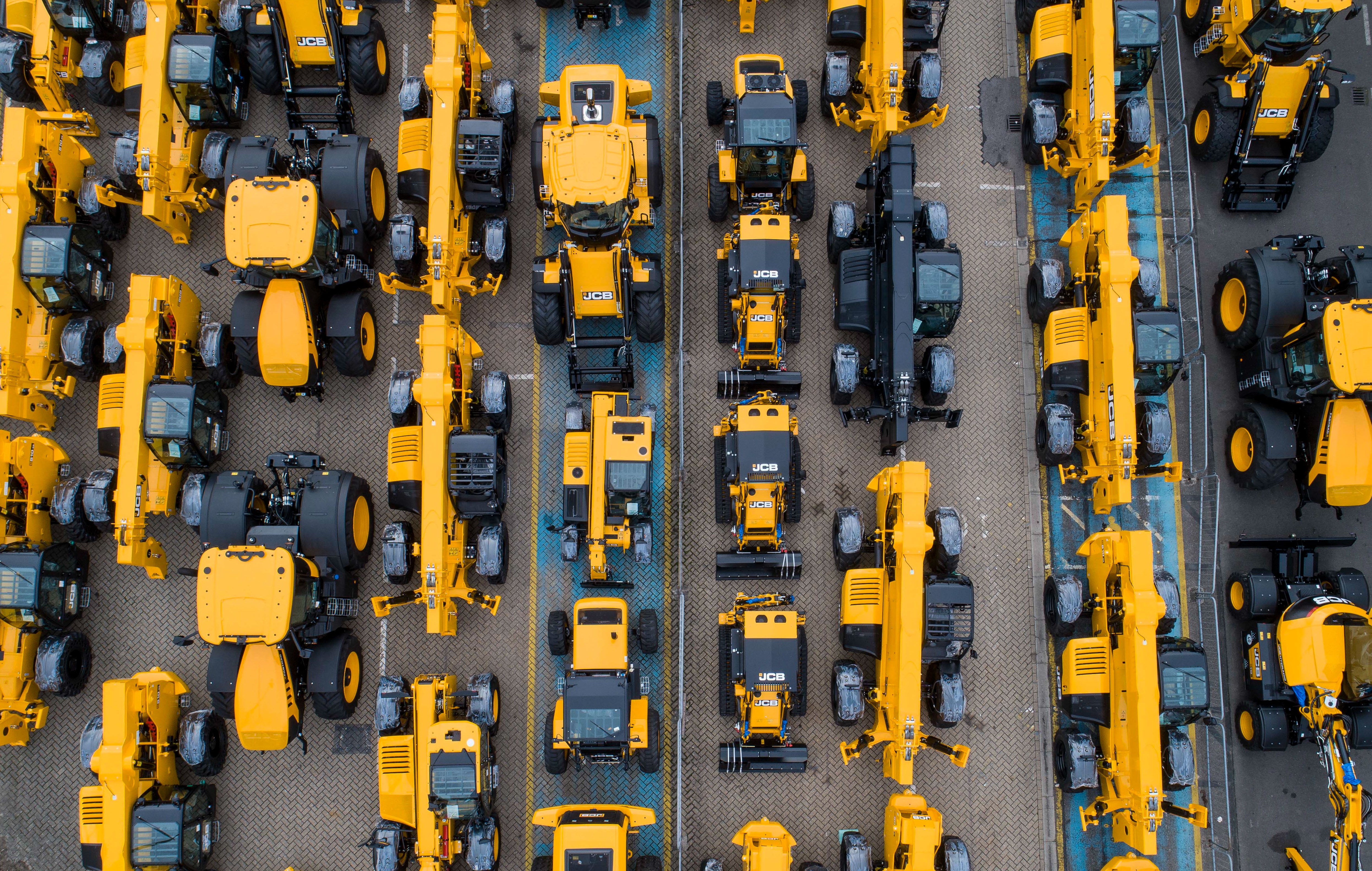 JCB is renowned for its distinctive yellow excavators and other industrial machinery