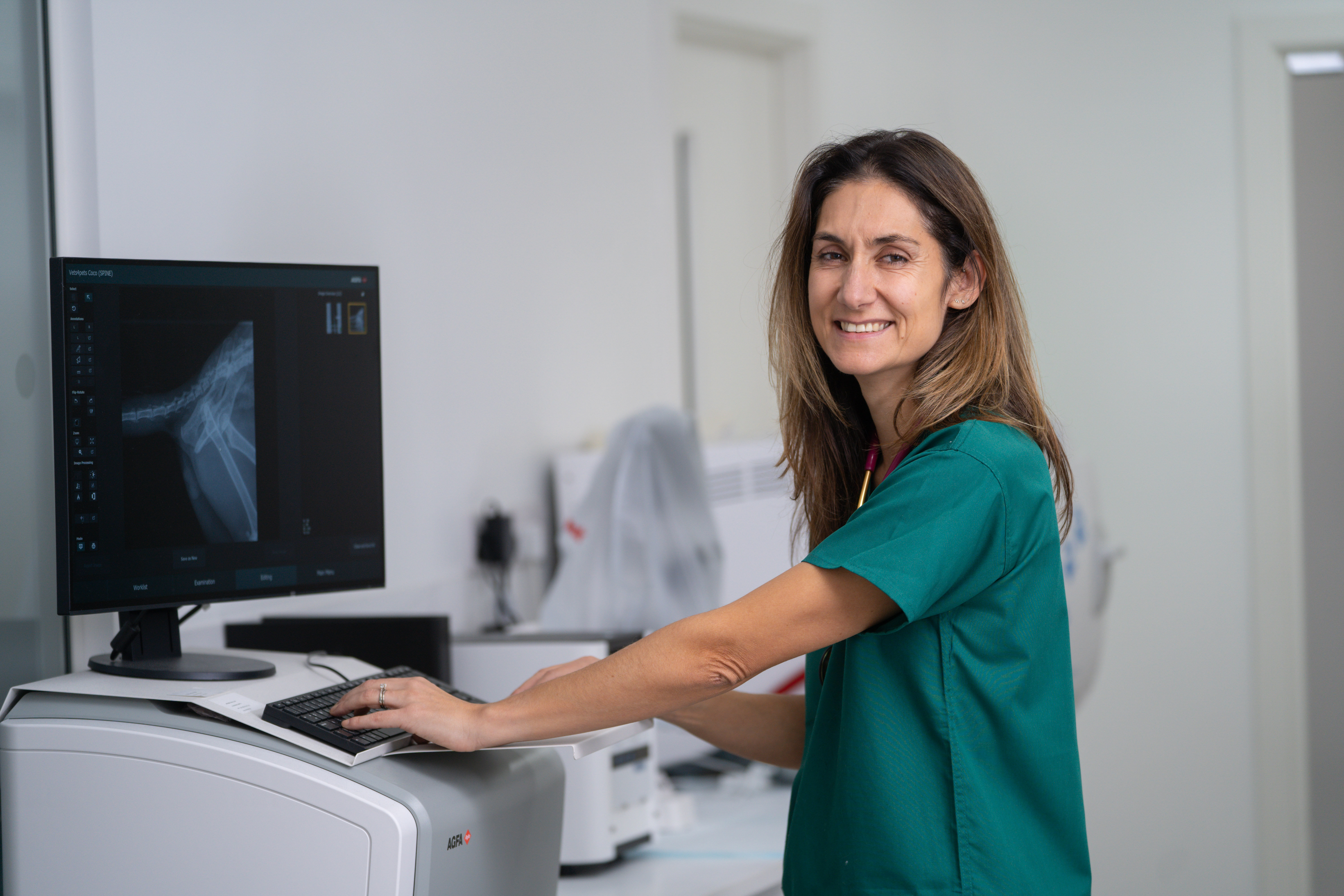 Veterinarian Hayley Baker reviewing an x-ray.