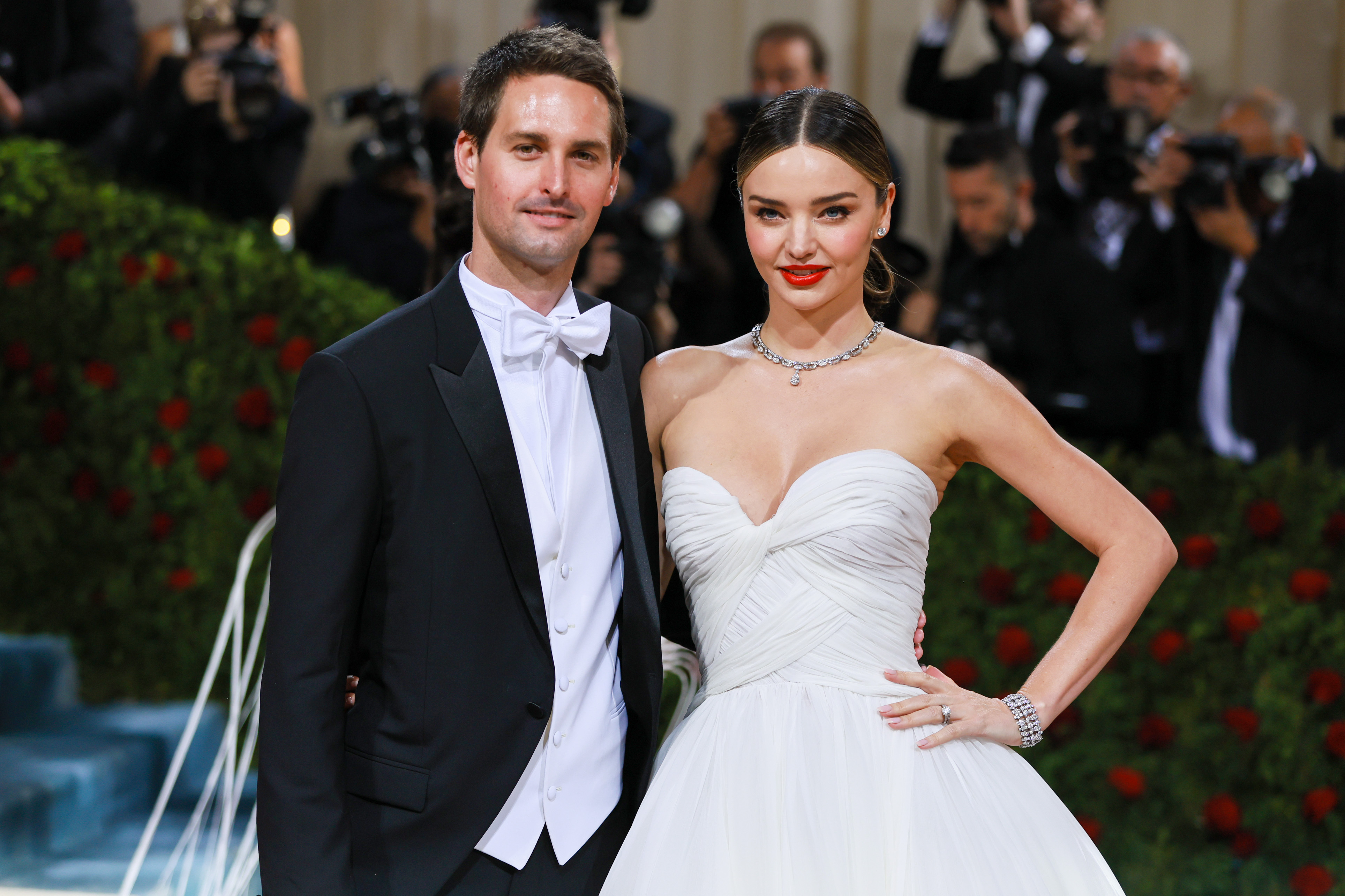 Description of Evan Spiegel, who is married to Australian model Miranda Kerr, discussing the development costs of the glasses