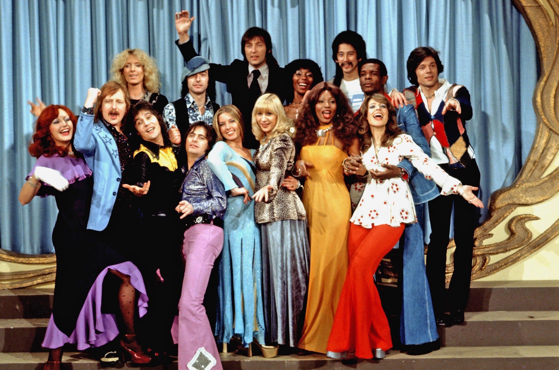 Mitchell in Les Humphries Singers in 1974, front row, second right