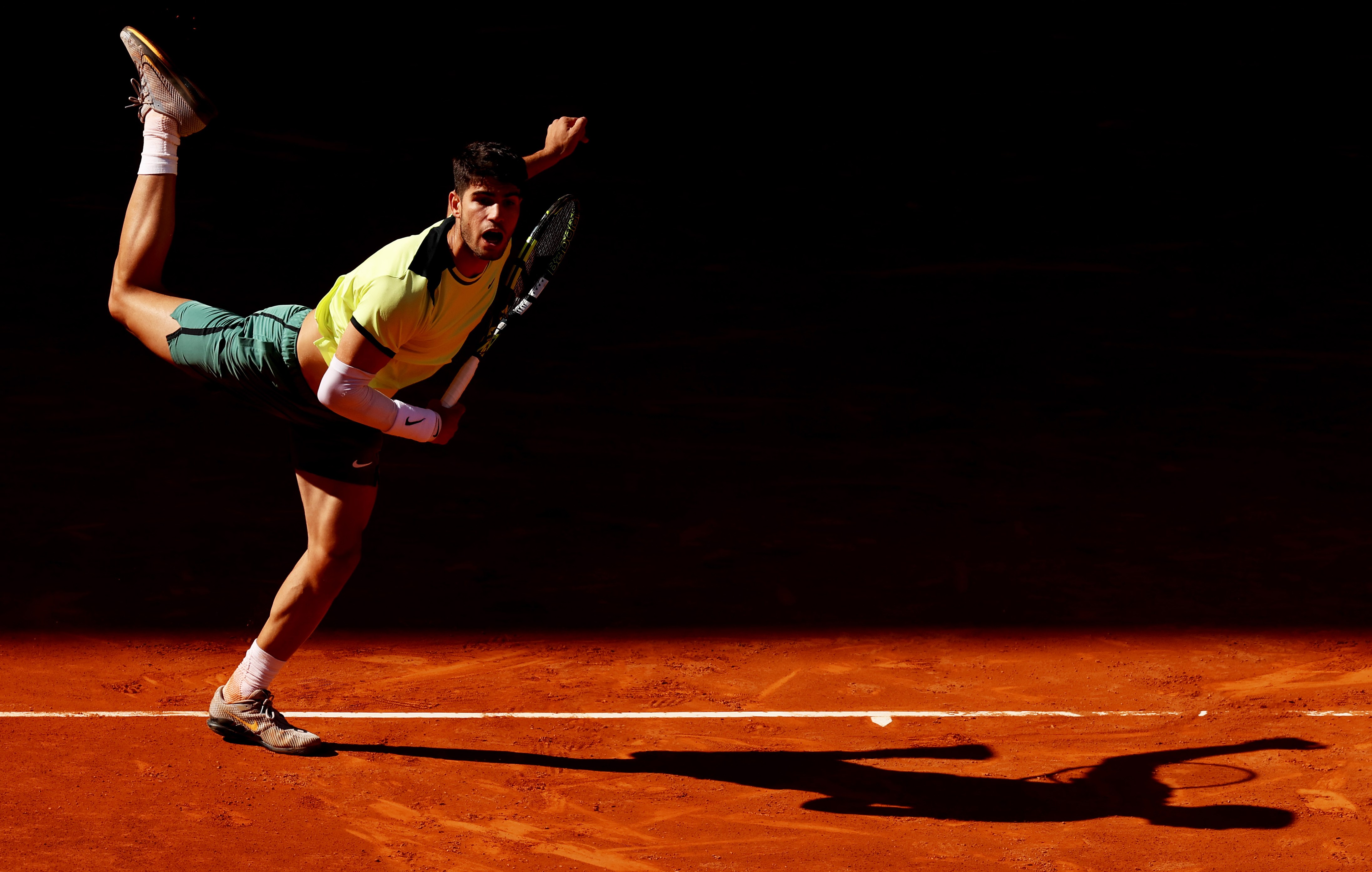 Alcaraz unleashes his serve at the Madrid Open in April