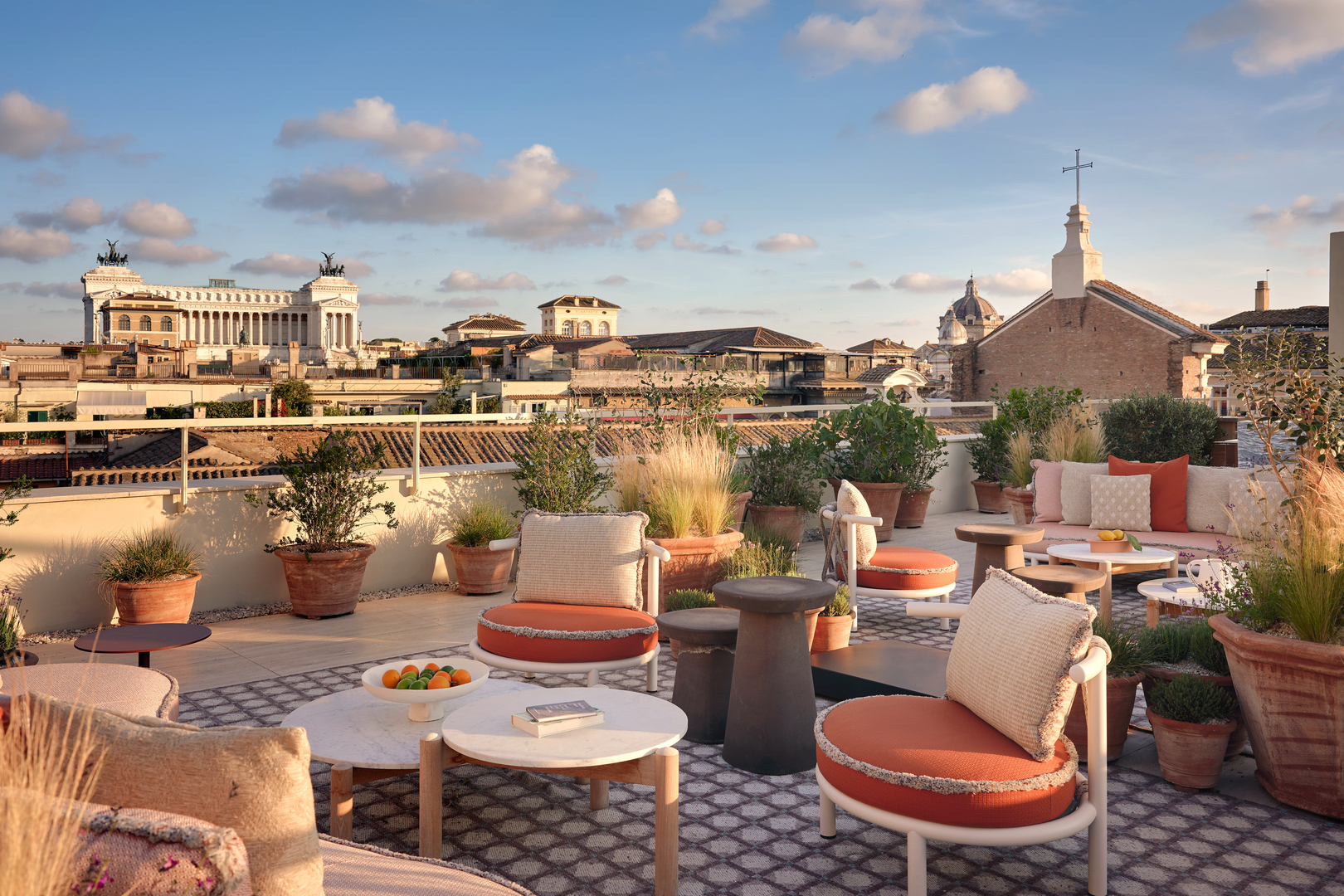 The rooftop terrace with cityscape view at Six Senses Rome hotel