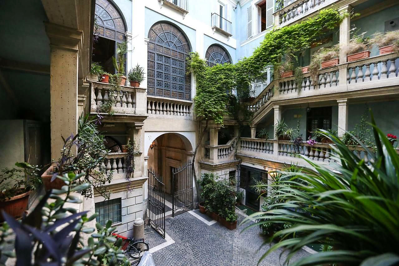 Элегантный люкс с исторической архитектурой в Palazzo Alibrandi.