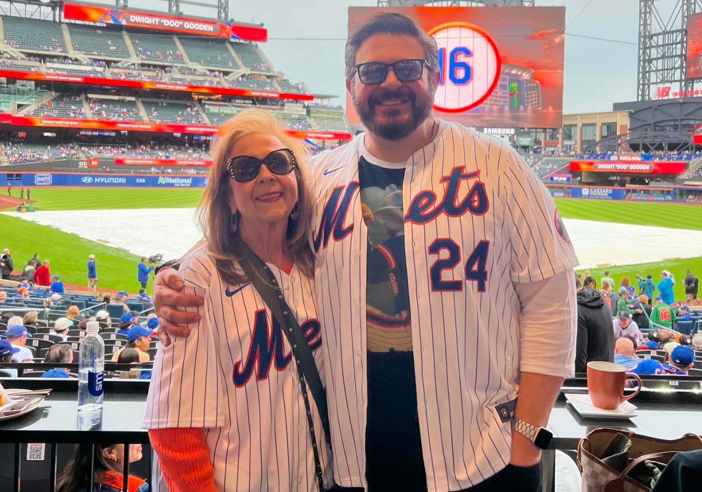 With his mother, Sharon